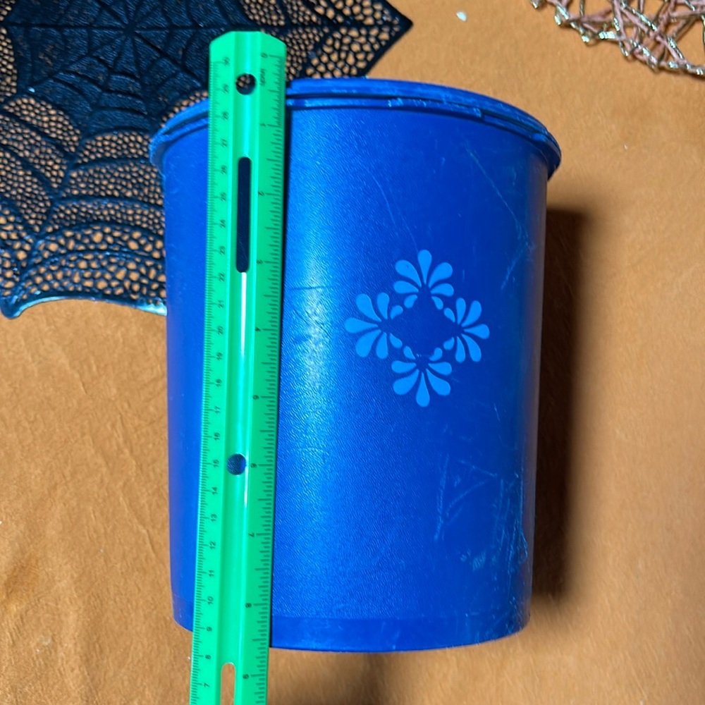 Vintage blue Tupperware container with lid